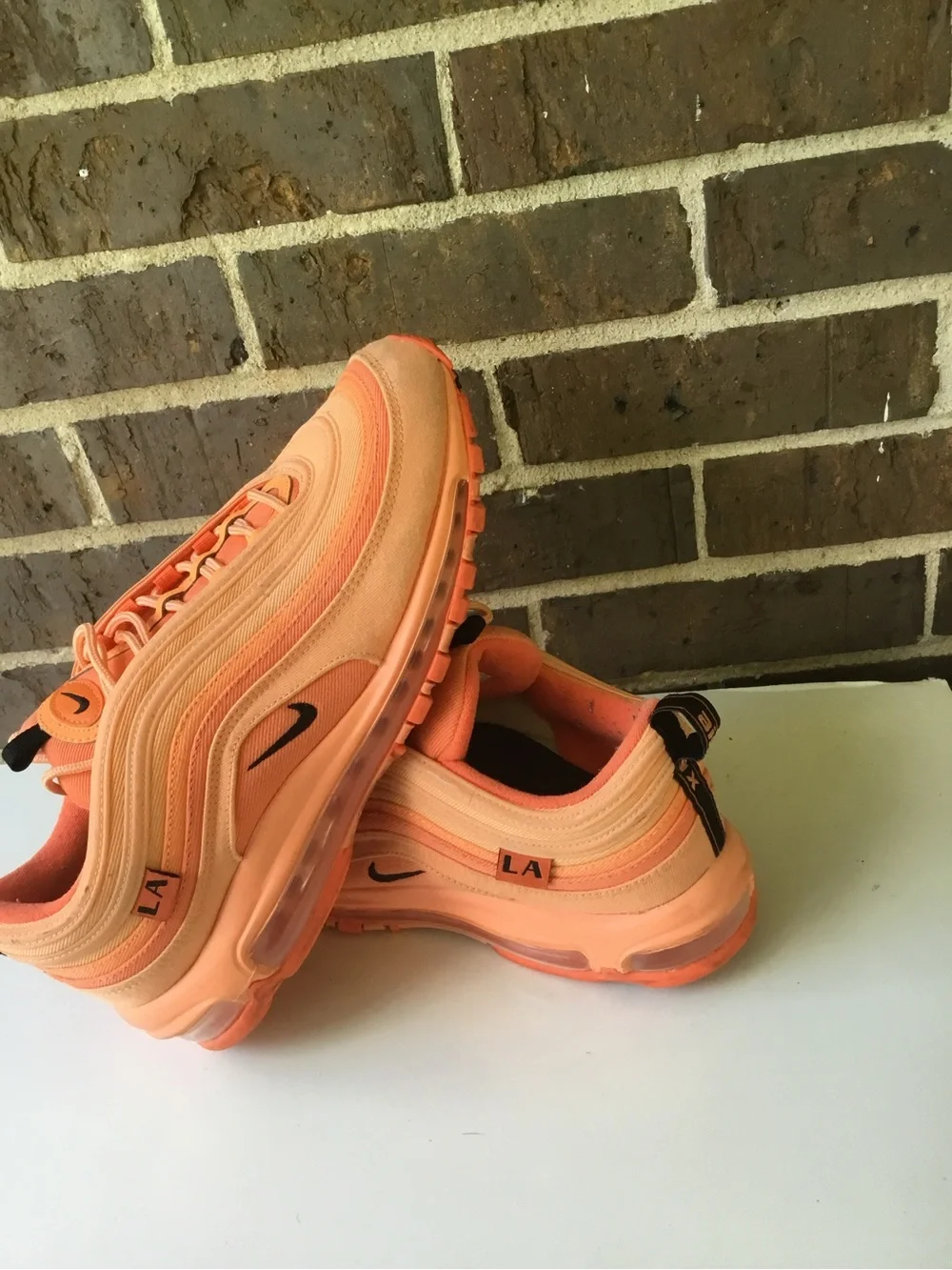 Nike Women’s Air Max 97 in Orange and Coral